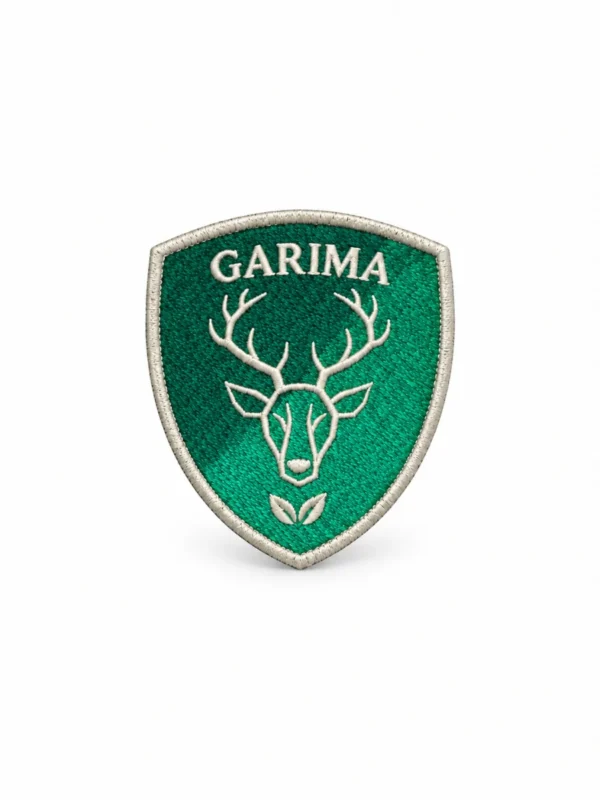 ecusson garima fond blanc v3 — uniforme Open World